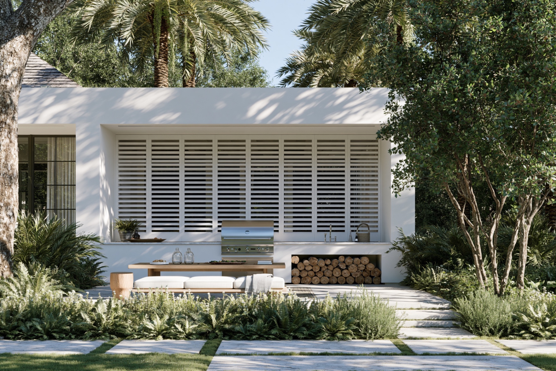 Miller House, Baton Rouge — outdoor kitchen tucked beneath live oak canopy